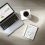 Lucid_Origin_Overhead_shot_of_a_minimalist_desk_with_a_sleek_s_1